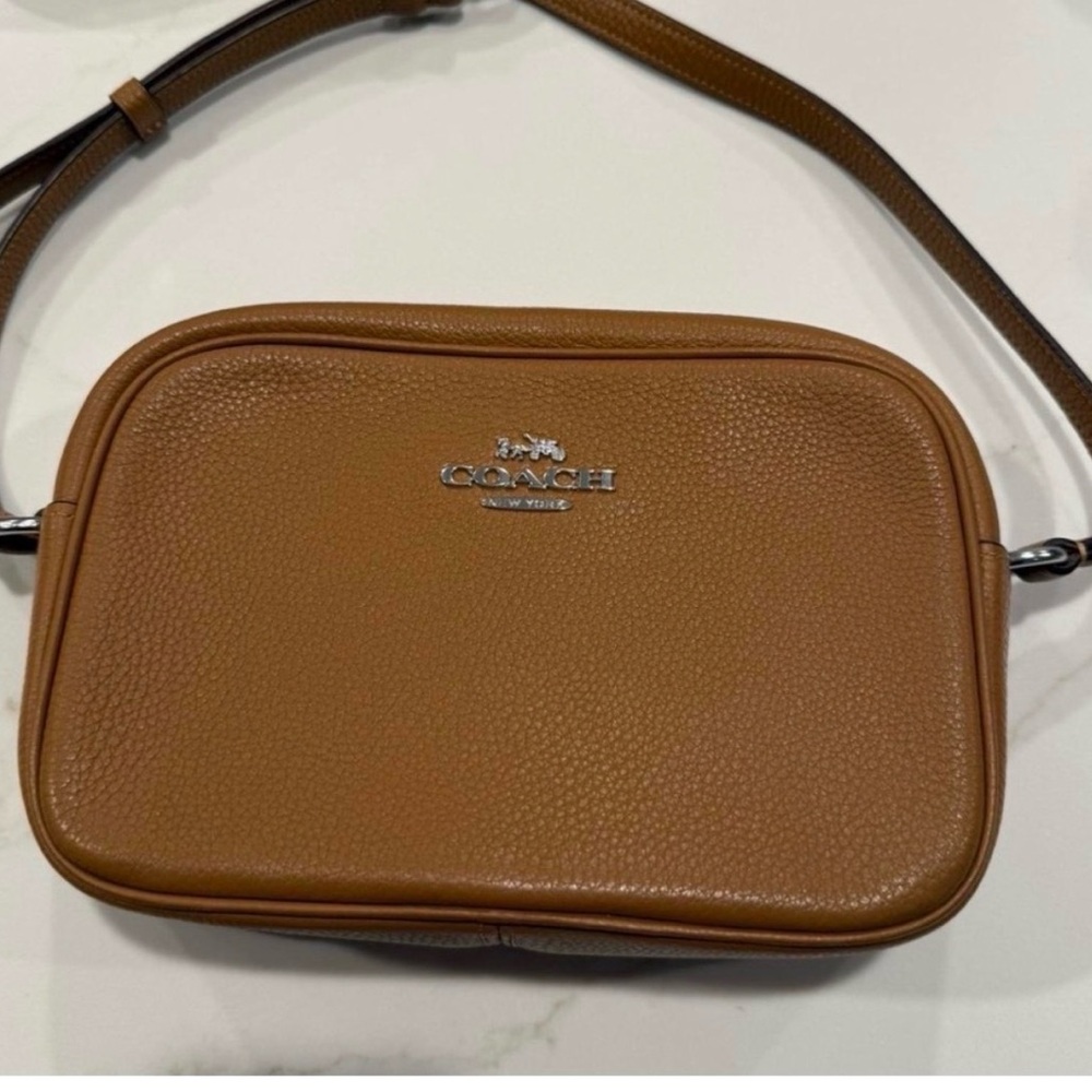 Never used coach purse bought for $200 great condition!